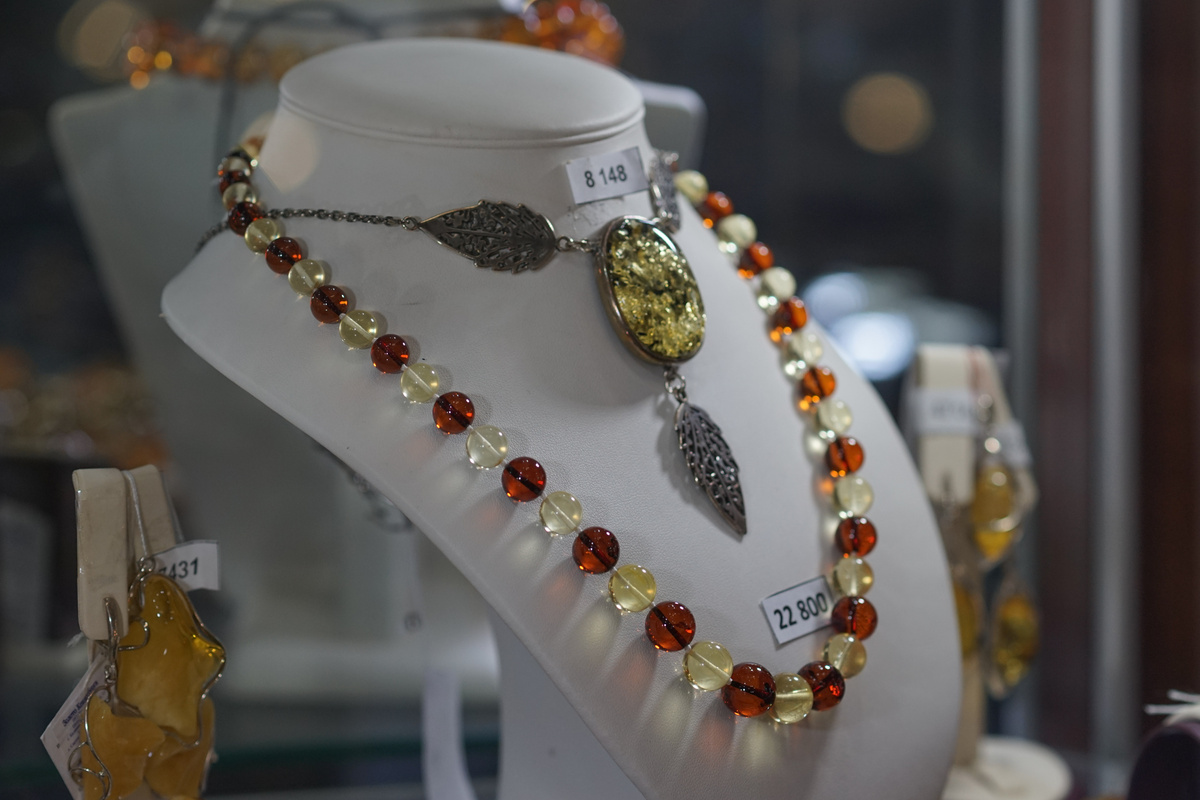 Beautiful amber jewelry on the shop window.